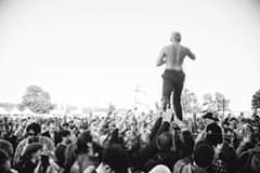 Image may contain: 3 people, crowd, sky and outdoor