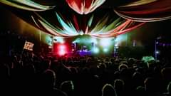 Image may contain: one or more people, crowd and night