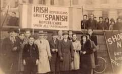 Image may contain: 10 people, people standing, text that says "IRISH REPUBLICANS GREET SPANISH SMASH ALL IMPERIALISMS REPUBLICANS 10 SHO N N UNIT QUCAT DIVII"