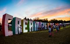 Image may contain: one or more people, sky, cloud, tree and outdoor