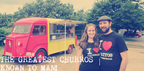 Image may contain: 2 people, people standing, sky and outdoor, text that says "THE GREATEST CHURROS CHURROS urros wacoscouk KNOWN TO MAN!"