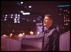 Image may contain: 1 person, night