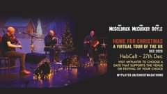 Image may contain: one or more people, people on stage and night, text that says "MIKE JOHN JOHN MCGOLDRICK MCCUSKER DOYLE HOME FOR CHRISTMAS A VIRTUAL TOUR OF THE UK DEC 2020 HebCelt- 27th Dec VISIT MYPLAYER TO CHOOSE A DATE THAT SUPPORTS THE VENUE OR FESTIVAL OF YOUR CHOICE MYPLAYER.UK/CHRISTMASATHOME"