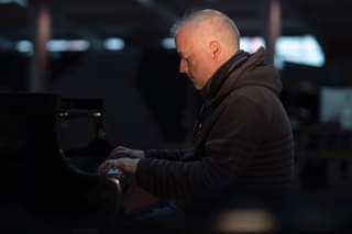 Image may contain: one or more people and people sitting