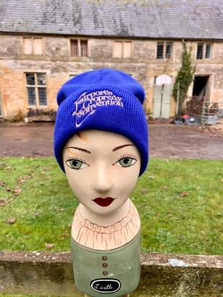 Image may contain: 1 person, hat and outdoor