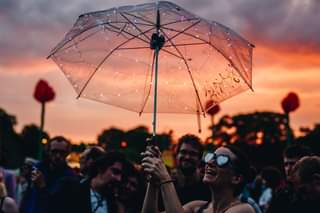 Image may contain: 2 people, sky, twilight, cloud, outdoor and water