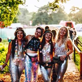 Image may contain: 4 people, people dancing, people standing and outdoor