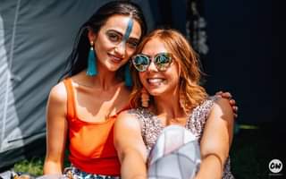 May be an image of 2 people, people standing and sunglasses