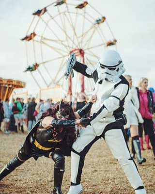 May be an image of one or more people, people standing and outdoors