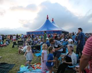 May be an image of 3 people, people standing and outdoors