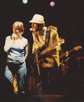 May be an image of 2 people, people playing musical instruments, people standing and guitar