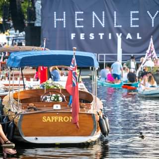 May be an image of one or more people and body of water