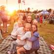 May be an image of 4 people, child, people standing and outdoors