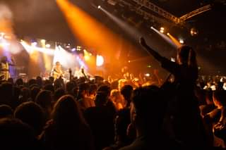 May be an image of one or more people, people standing and crowd