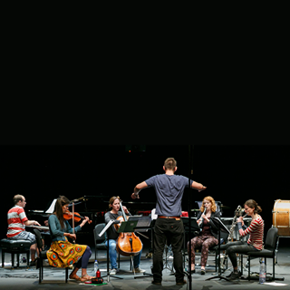 May be an image of 3 people, people playing musical instruments and indoor