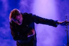 May be an image of one or more people, people standing and people playing musical instruments