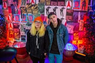 May be an image of 3 people, people standing and indoor