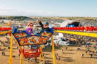 May be an image of 2 people, people standing and outdoors