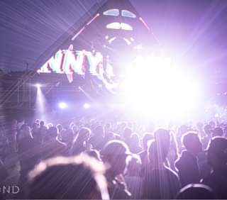 May be an image of one or more people, crowd and text that says "ND"