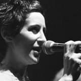 May be a black-and-white image of one or more people and people playing musical instruments