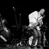 May be an image of one or more people, people playing musical instruments and people standing