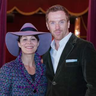 May be an image of 2 people, people standing and suit