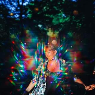 May be an image of 1 person, standing and outdoors