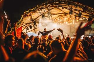 May be an image of 1 person, standing and crowd