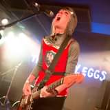 May be an image of one or more people, people playing musical instruments, people standing, guitar and indoor