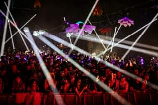 May be an image of 4 people, people standing and crowd