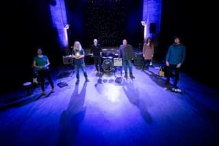 May be an image of 1 person, standing and indoor