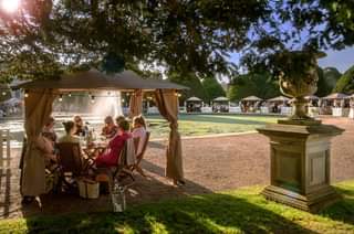 May be an image of one or more people, tree and outdoors