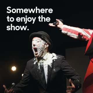 May be an image of one or more people and text that says "Somewhere to enjoy the show."