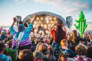 May be an image of one or more people, people standing, crowd and outdoors