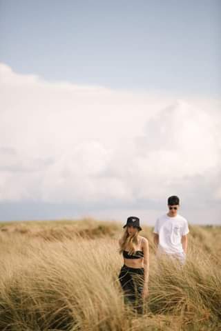 May be an image of 2 people, nature and cloud