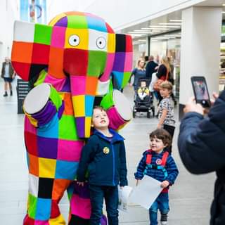 May be an image of 2 people, child and people standing