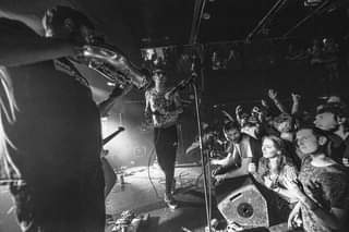 May be an image of 5 people and people standing