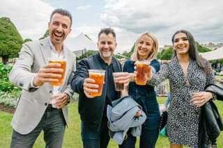 May be an image of 4 people, drink and outdoors