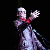 May be an image of 1 person, playing a musical instrument and indoor