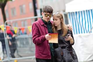 May be an image of 2 people, people standing and outdoors