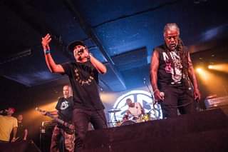 May be an image of 2 people, people standing and indoor